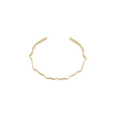 Alaya Manschettenarmband mit kleinen Wellen. Vergoldet. Dänisches Kopenhagen