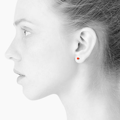 Sign Heart nano earrings. Neon red orange. Sterling silver. Scherning Copenhagen
