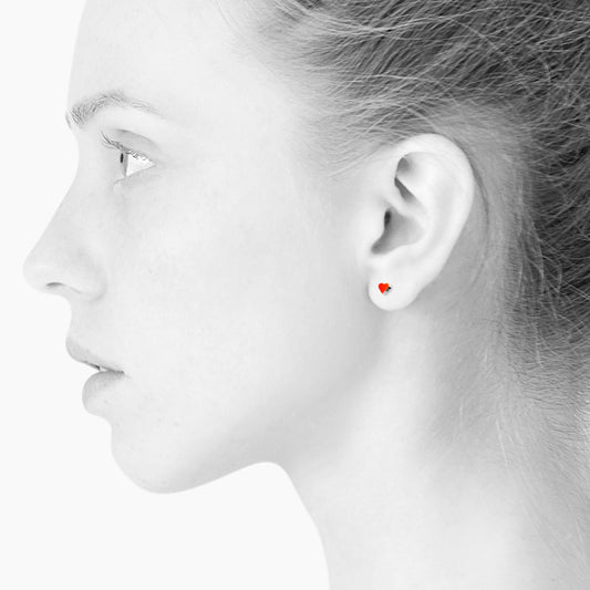 Sign Heart nano earrings. Neon red orange. Sterling silver. Scherning Copenhagen